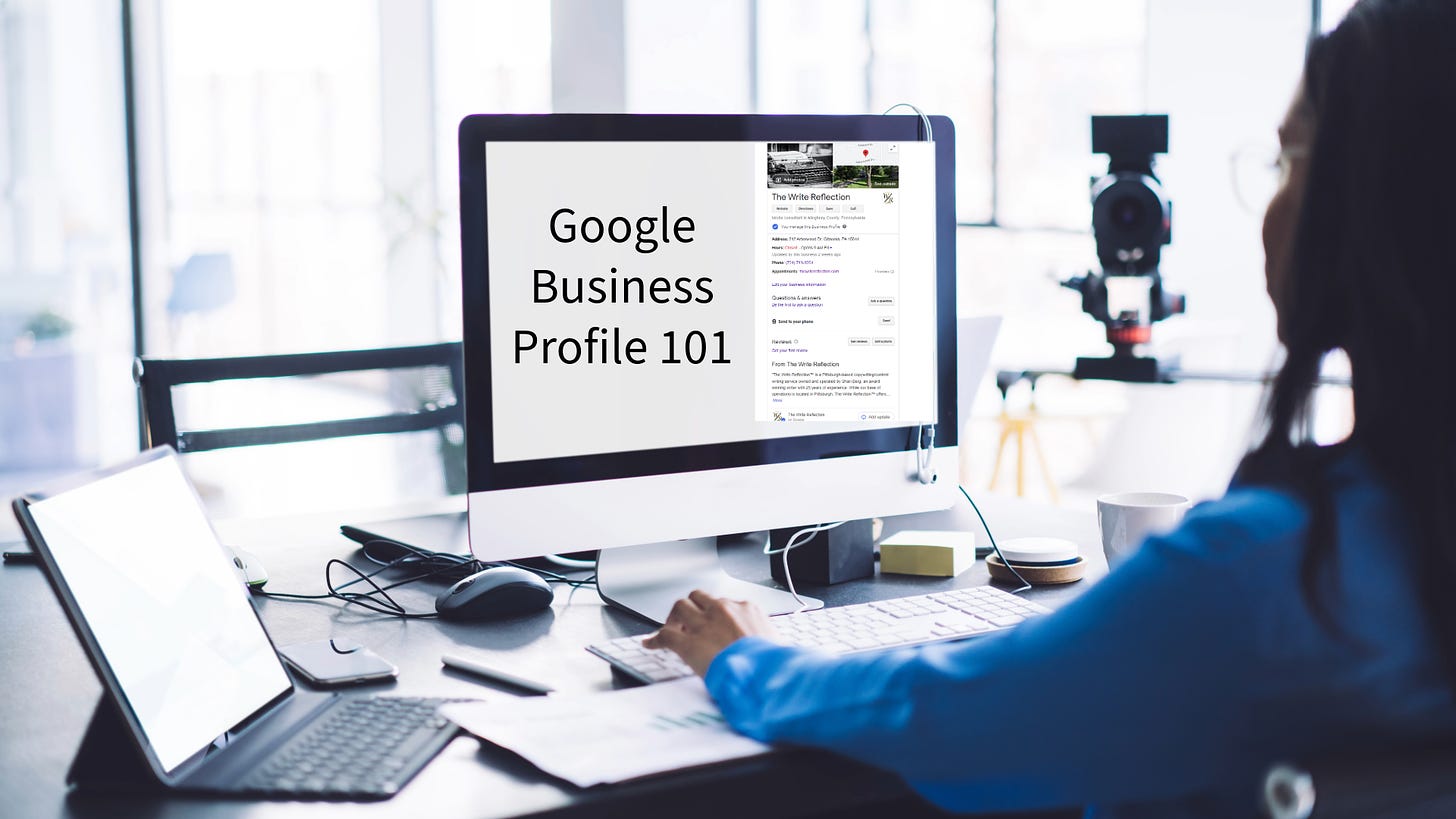 A woman sits in front of a large computer monitor on her desk that shows a GBP listing for The Write Reflection and displays the words "Google Business Profile 101"