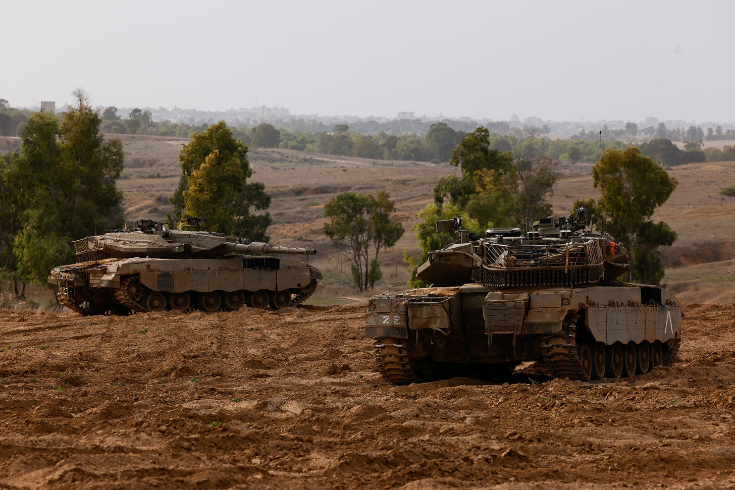 Israeli tanks take position near a border with Gaza