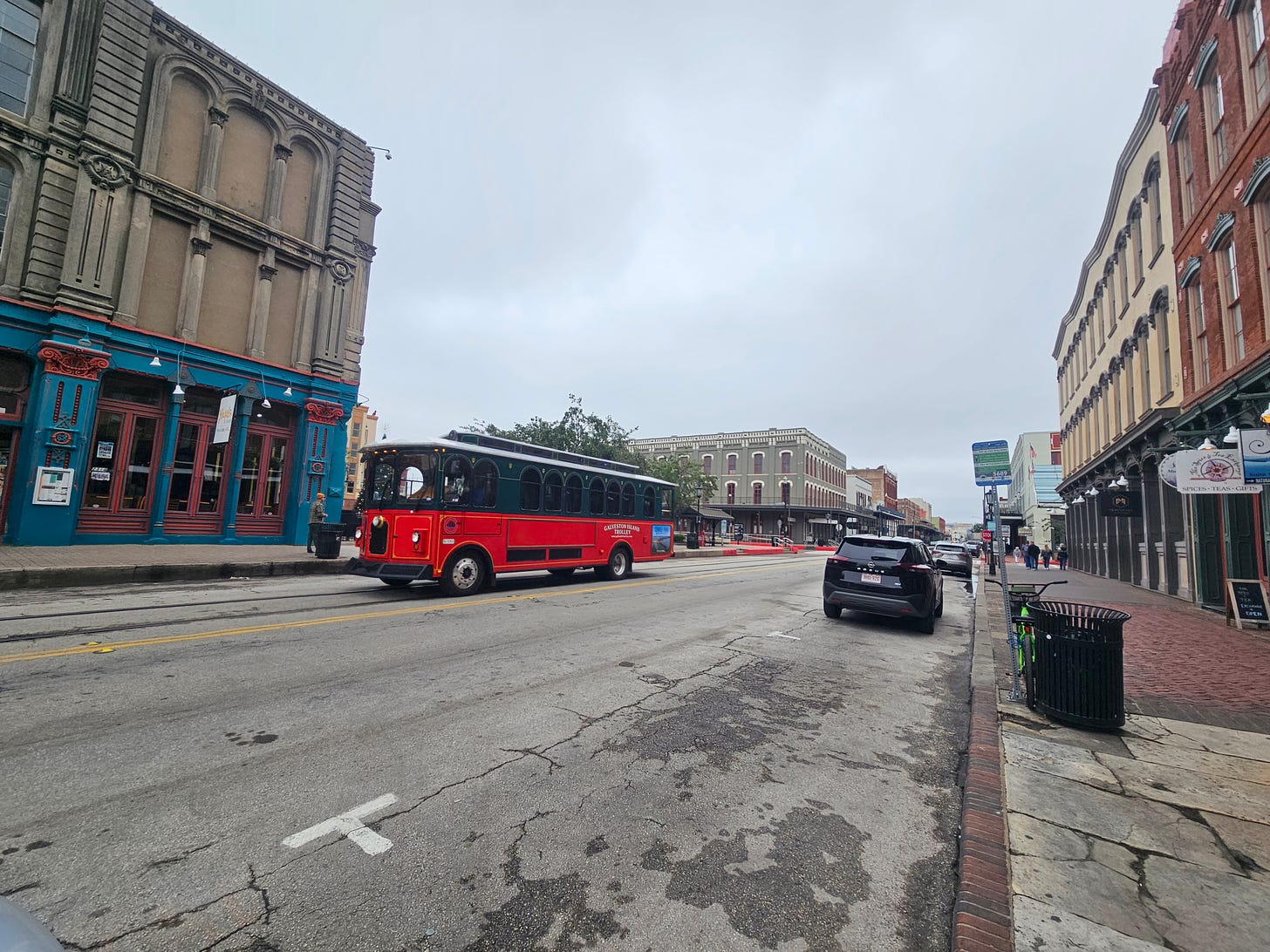A city trolley as it travels along the Strand in historic Galveston