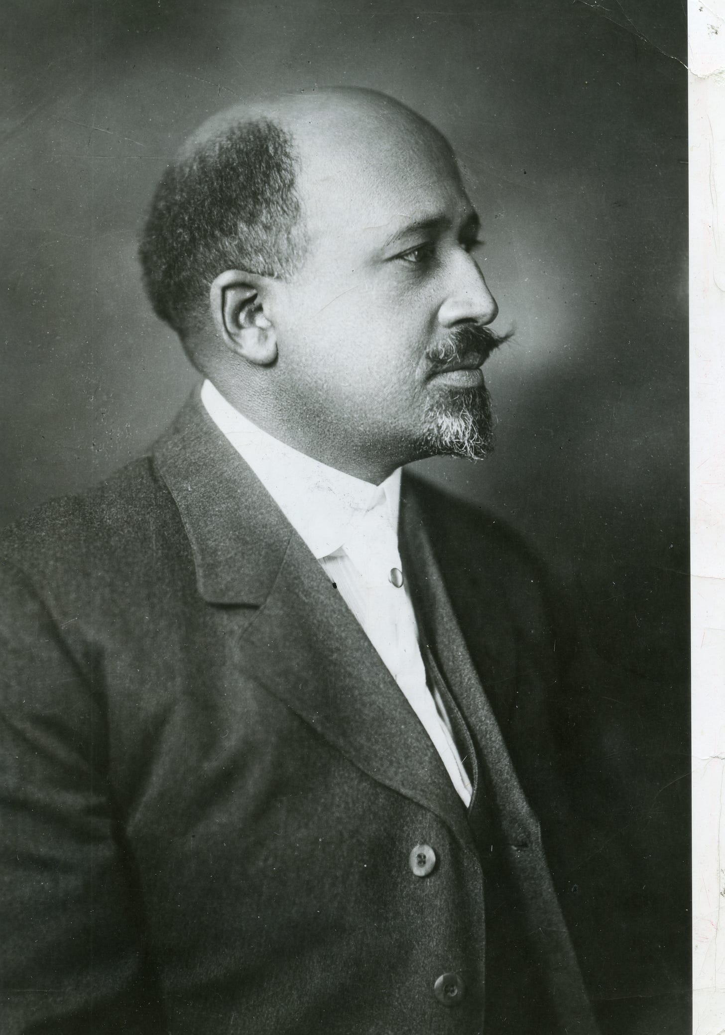 A black-and-while portrait (in profile) of author W.E.B. Du Bois.