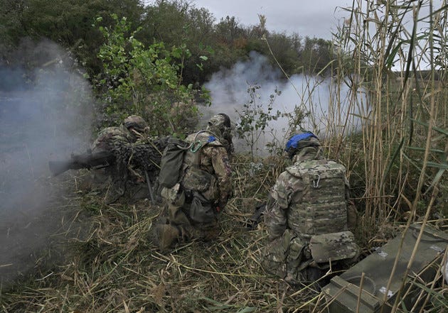 Ukrainian servicemen of the 3rd assault brigade fire a SPG-9 recoilless gun during a tactical training at an undisclosed location in the Donetsk region on Oct. 13, 2023, amid the Russia invasion of Ukraine.