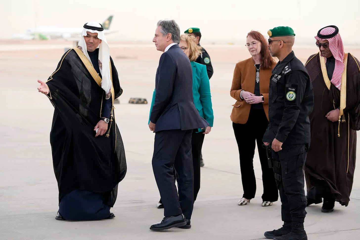 U.S. Secretary of State Antony Blinken disembarks from a plane in Saudi Arabia.