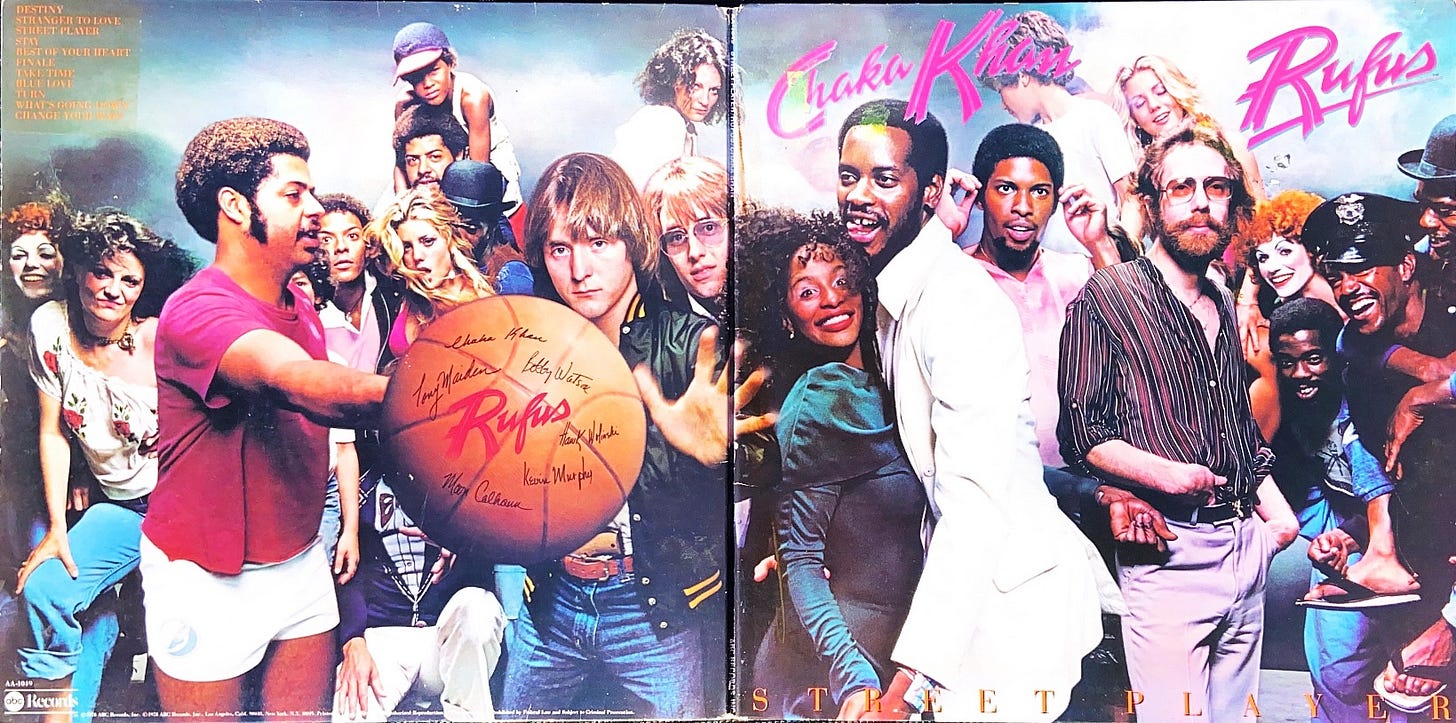 the front and back covers of the album Street Player - when opened up, it creates a complete image of a playful scene with the band front and center, plus a cast of colorful characters (clowns and cops alike) behind them.