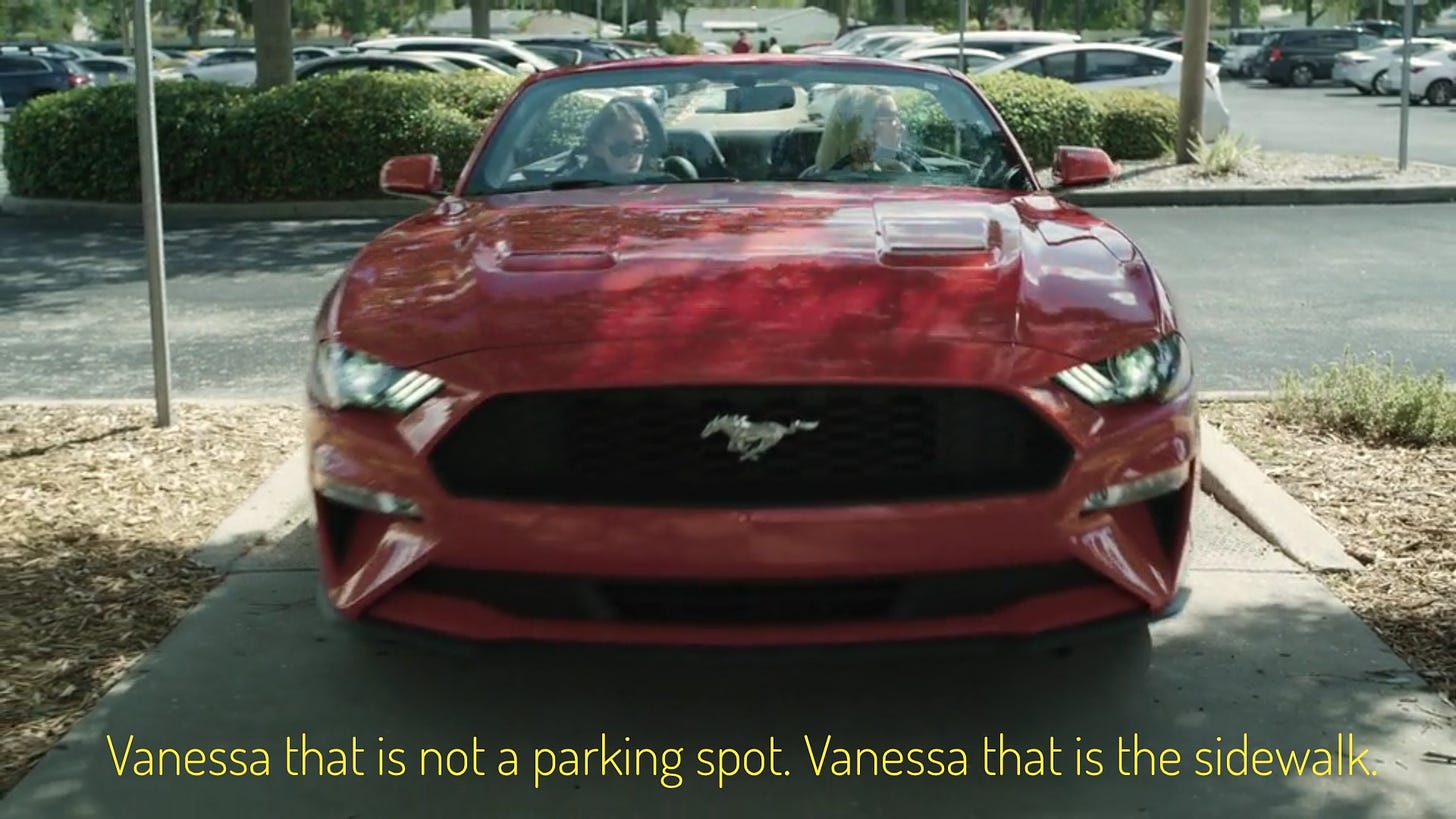 Vanessa and Serena's Mustang clearly on the sidewalk, captioned "Vanessa that is not a parking spot. Vanessa that is the sidewalk."