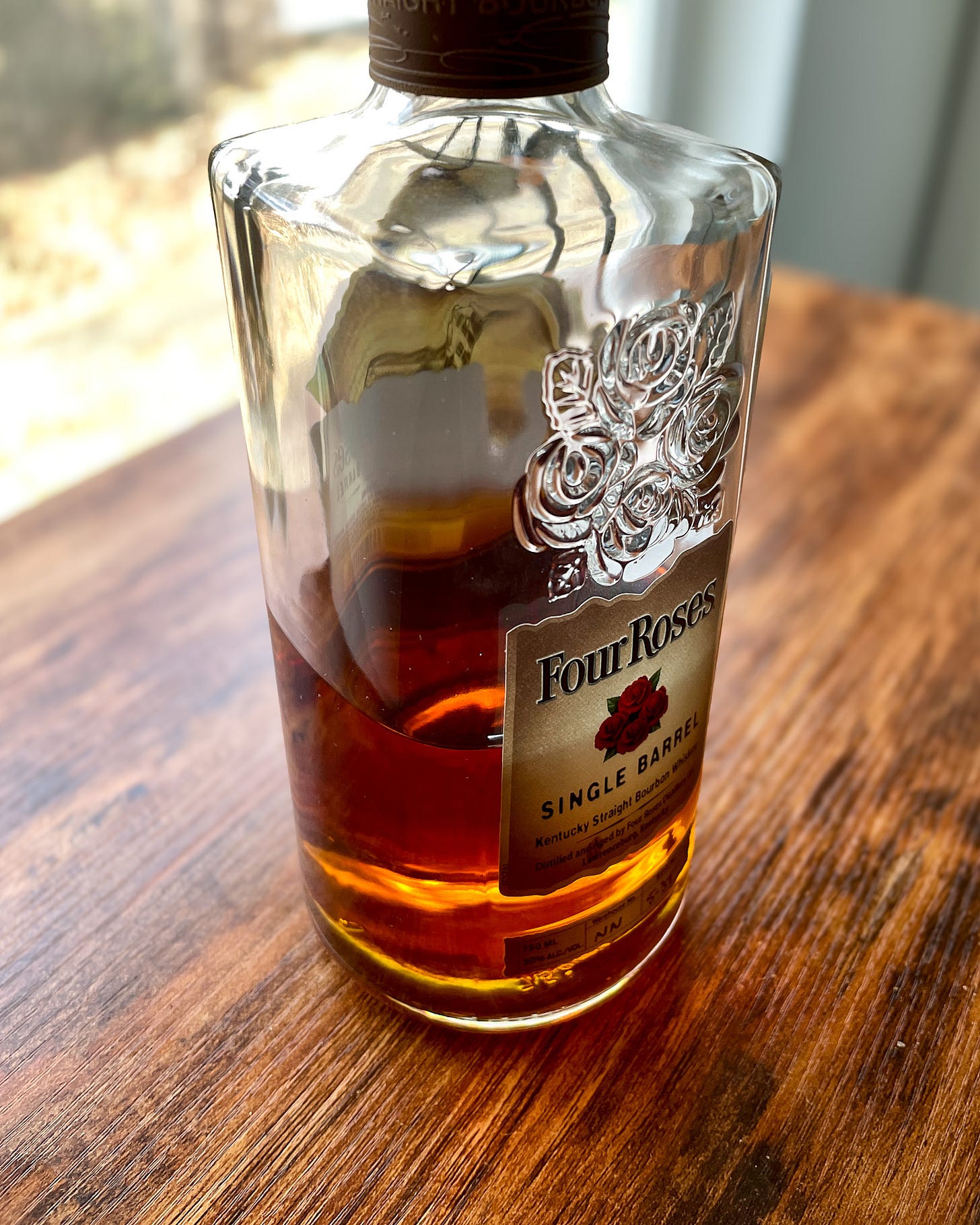 A bottle of Four Roses single barrel whiskey.