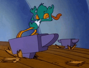 An animated anvil dropping on the head of a cartoon duck