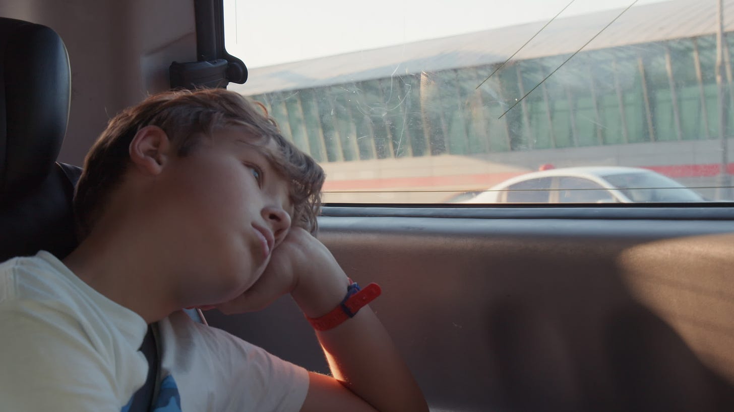 Long car ride makes him bored and tired