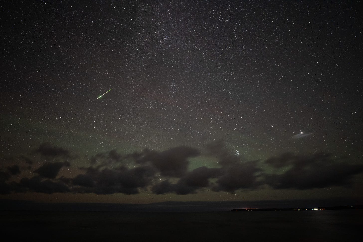 Stars and meteor over Lake Superior