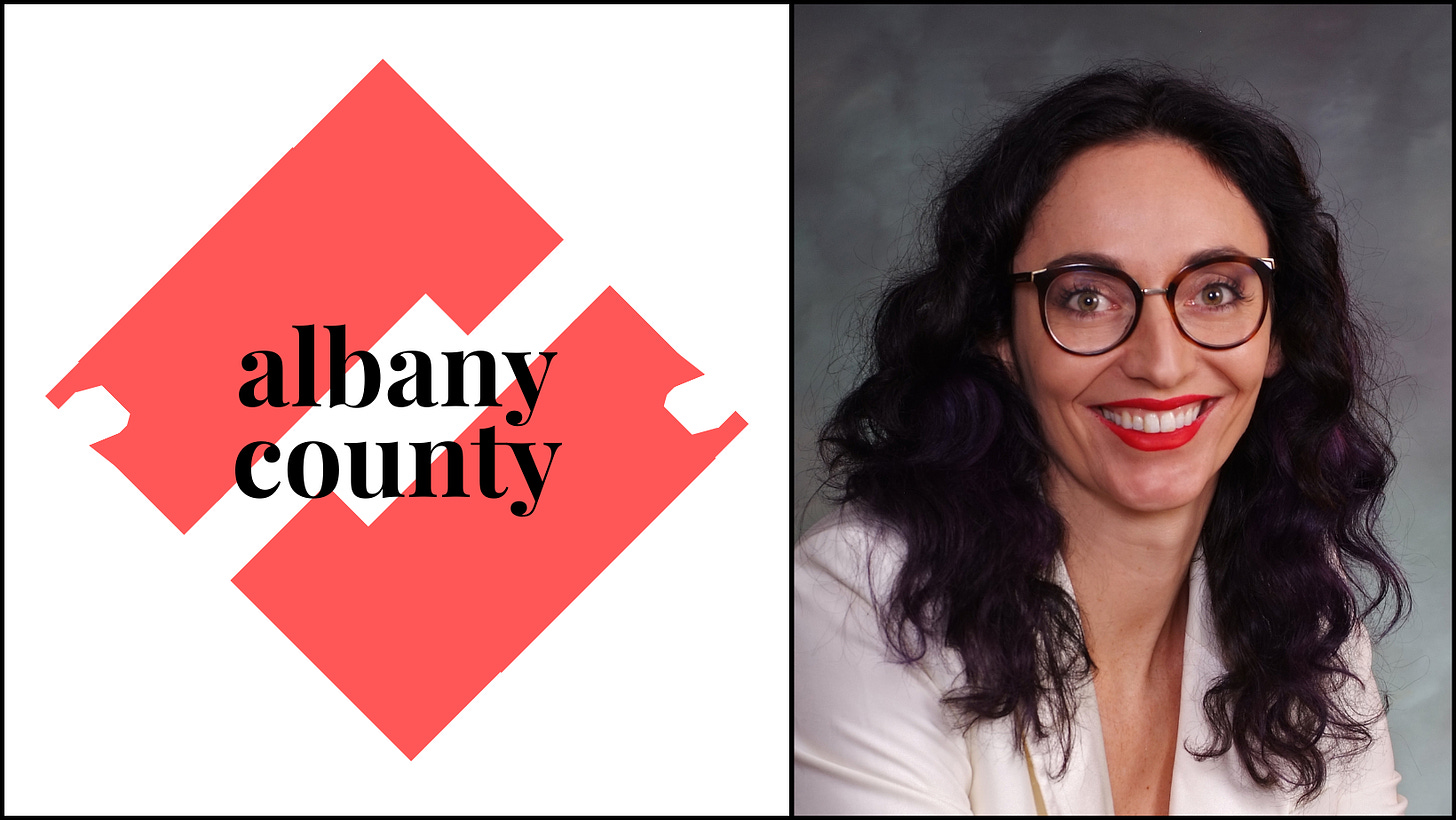 Provenza's official portrait alongside a stylized graphic logo for Albany County.