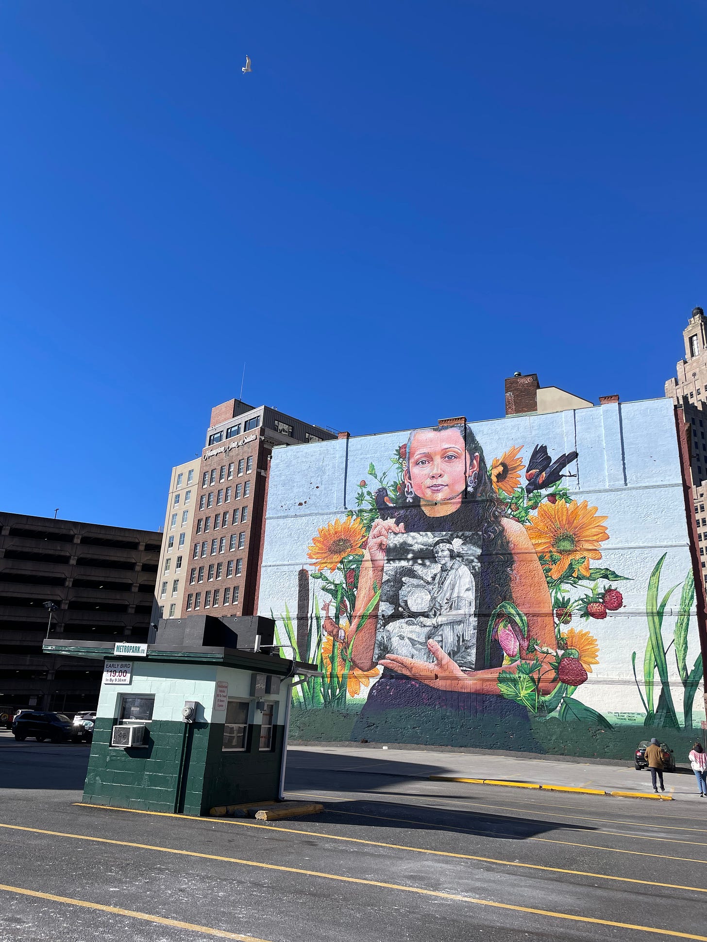 Mural of indigenous child on a warehouse in Providence