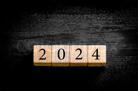 Year 2024. Wooden small cubes with ... | Stock image | Colourbox
