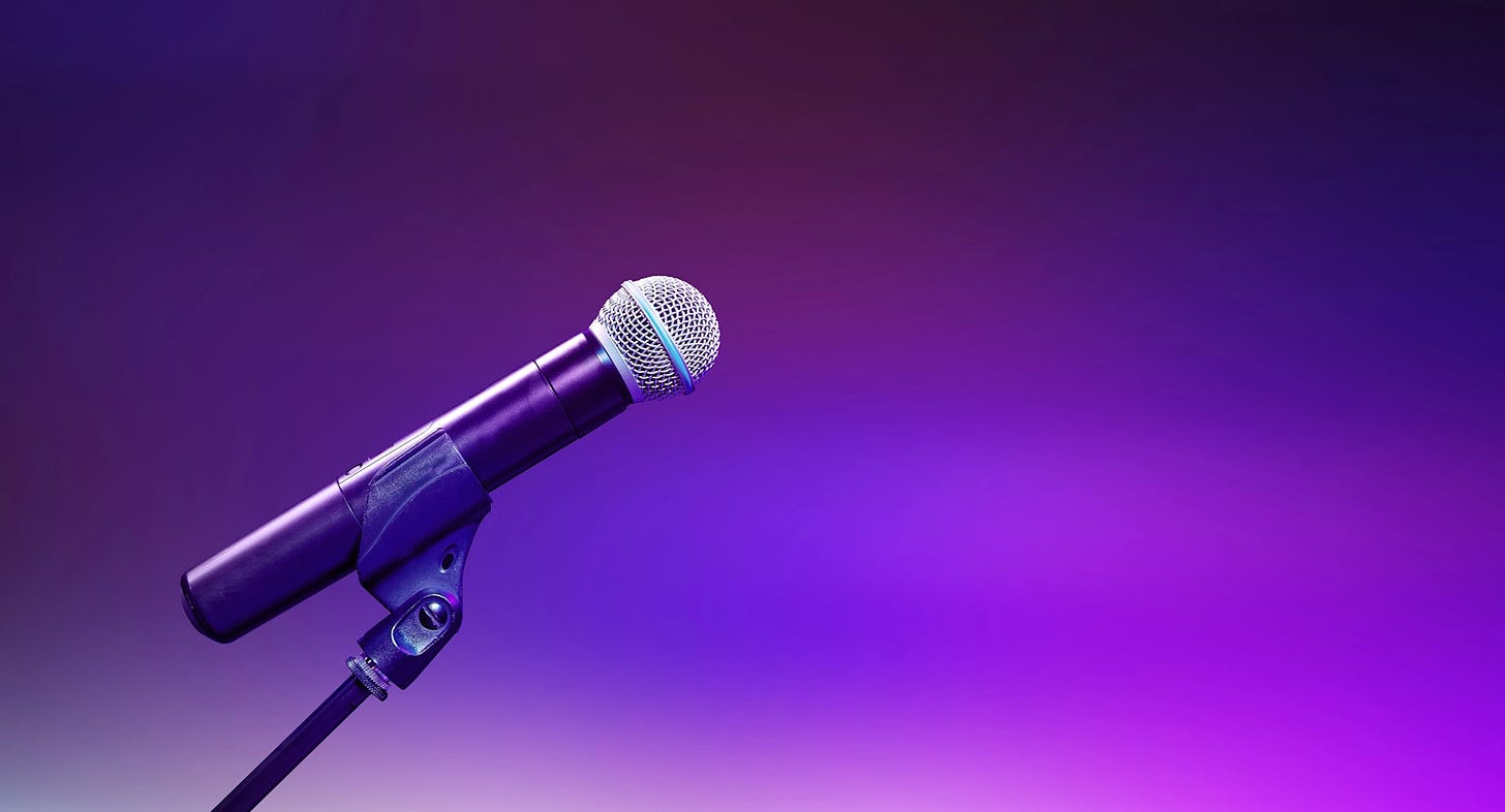 microphone against a purple background