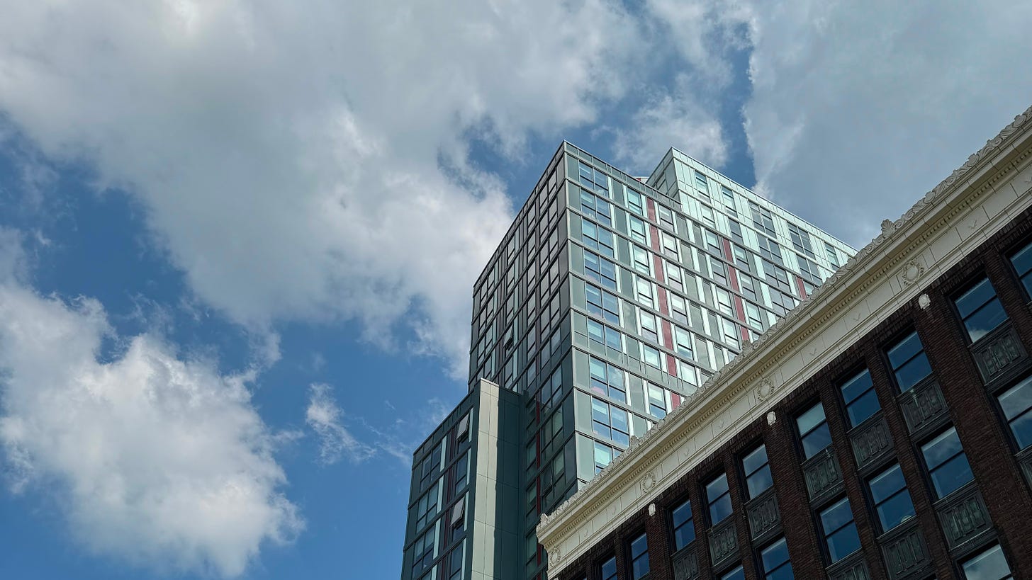 The William Thomas student residence rising into the sky above the Lister Block in downtown Hamilton