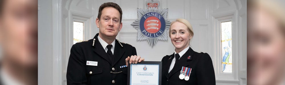 Essex Chief Constable Ben-Julian Harrington presents PC Victoria Price with her Commendation certificate