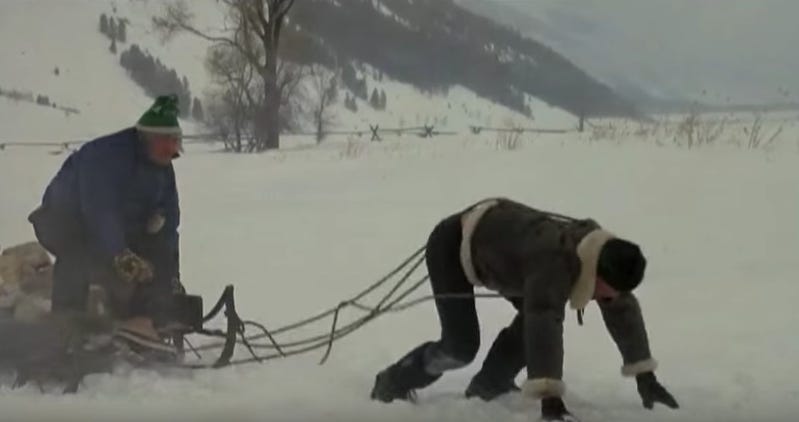 Rocky IV training montage shot. Rocky pulls a dog sled through the snow.