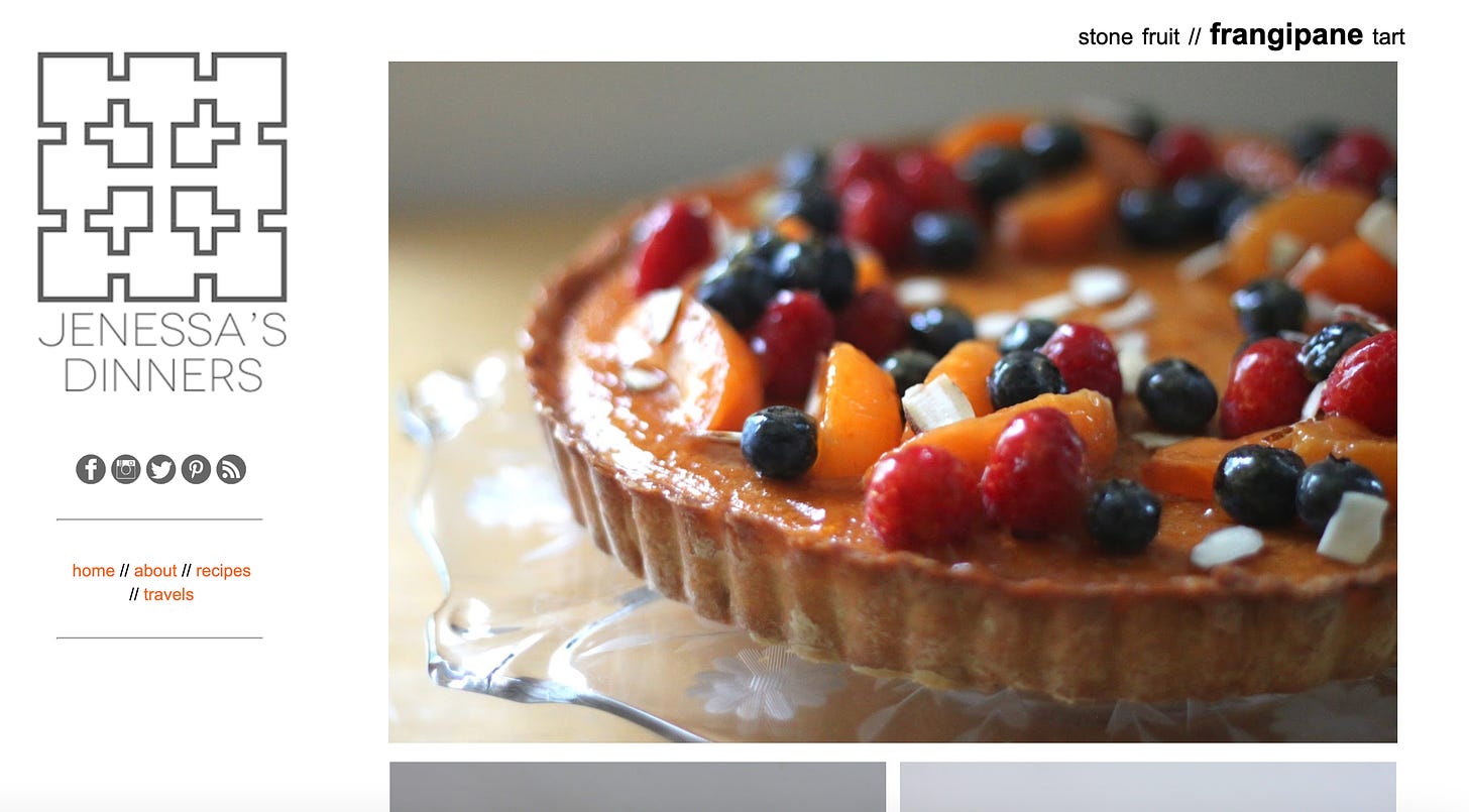 A screenshot of the main homepage of Jenessa's Dinners food blog. The top recipe is a frangipane tart with lots of brightly coloured fruit decorating the top, contrasting with the simple white background on the blog.