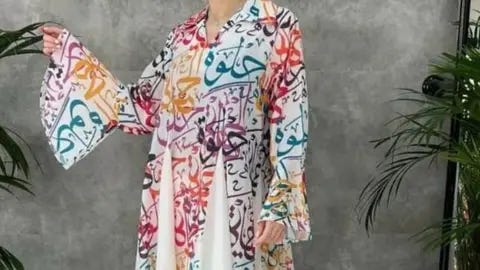 Shalik Riyadh/Instagram The dress has the word "Halwa" printed in Arabic letters on it, meaning beautiful in Arabic