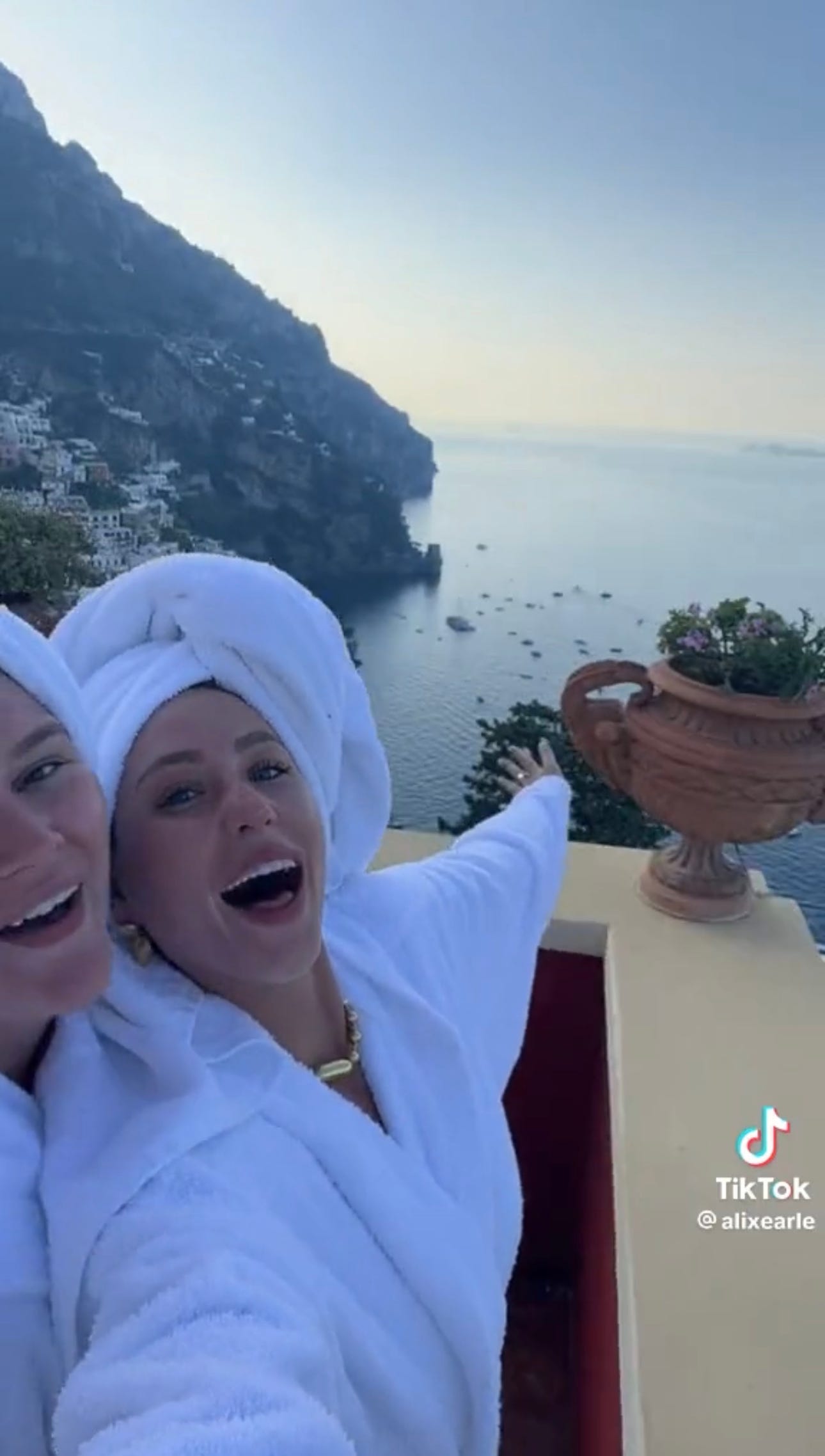 screenshot of a TikTok video featuring Alix Earle overlooking the Mediterranean with friends