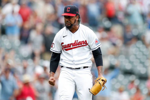 Emmanuel Clase of the Cleveland Guardians celebrates after the final out for a save following the ninth inning against the Minnesota Twins at...