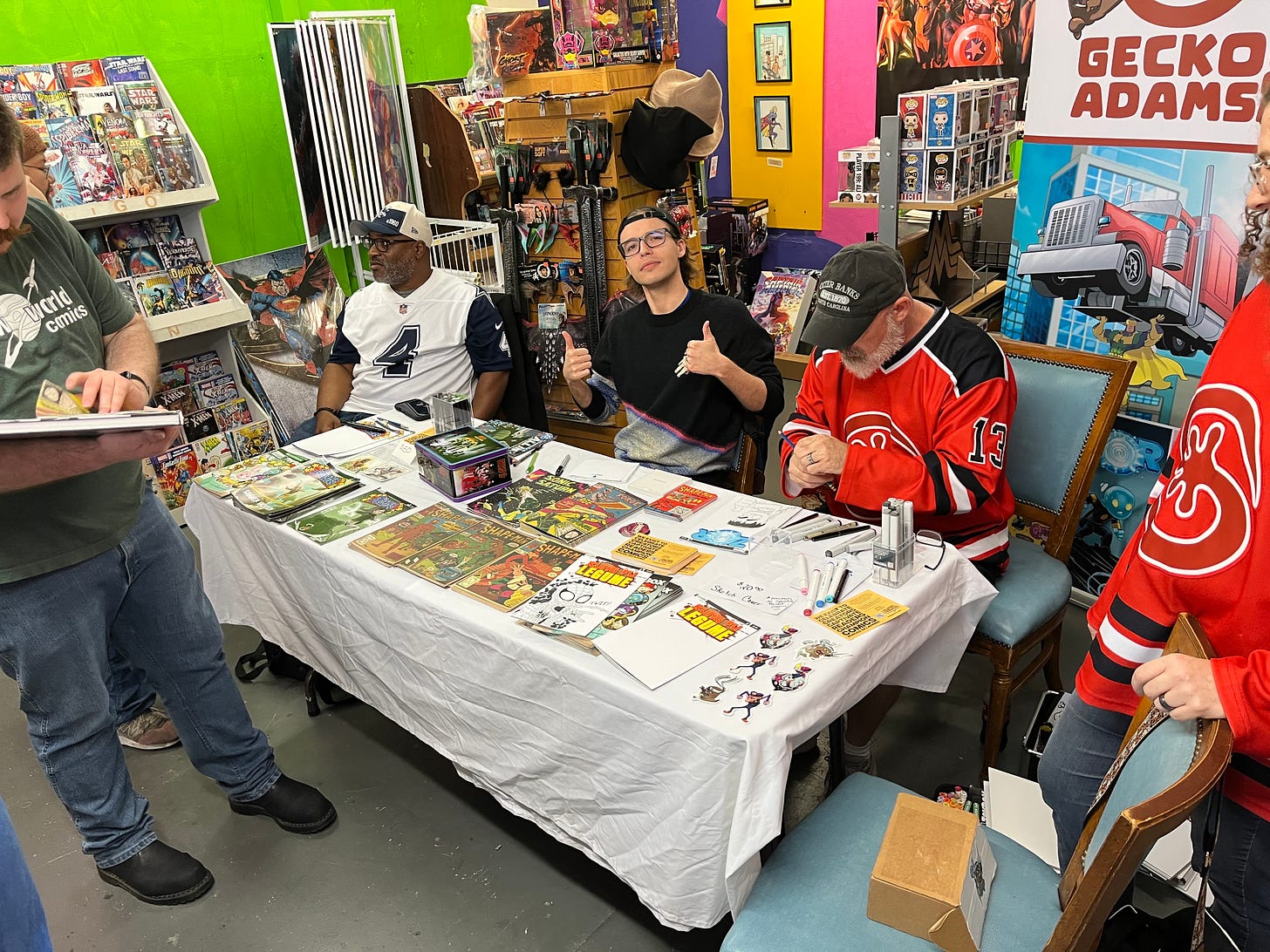 Artists Mario Wytch, Breyden Boyd, and Michael ‘Gecko’ Adams visit with fans at Free Comic Book Day. Artists Mario Wytch, Breyden Boyd, and Michael ‘Gecko’ Adams visit with fans at Free Comic Book Day.