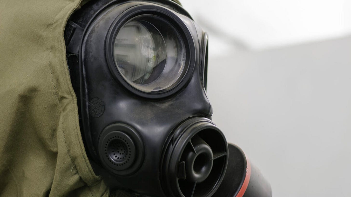 Gasmask and Nuclear, Biological and Chemical (NBC) suit