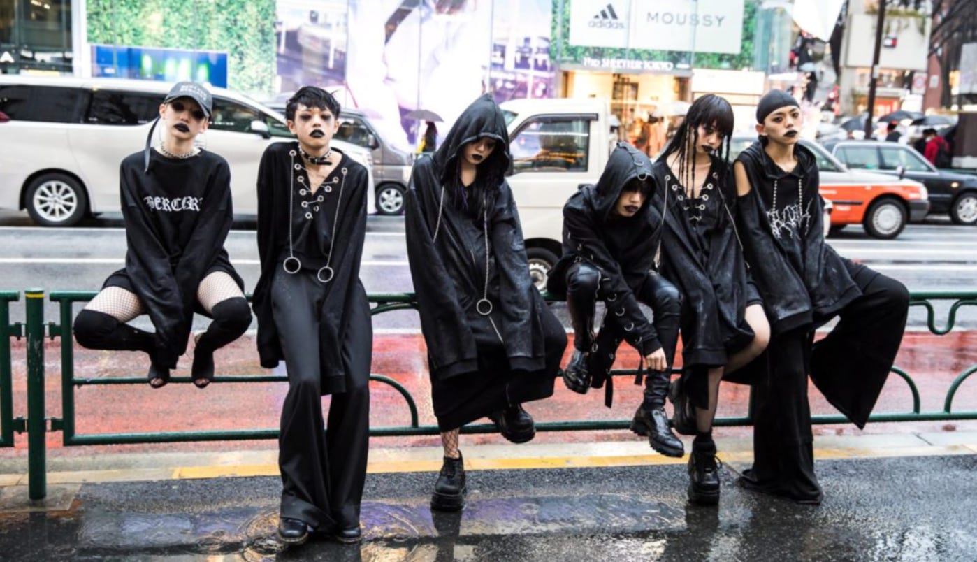 Some goth kids hanging out in Japan. https://aramajapan.com/news/fashionnews/know-japanese-street-fashion-2017/79792/