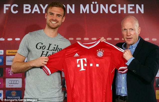 Mario Gotze wears Nike shirt at Bayern Munich unveiling with Adidas unhappy  | Daily Mail Online