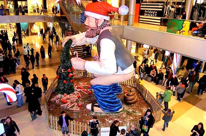 Weird Christmas Traditions: Spain’s Caganer & Caga Tió