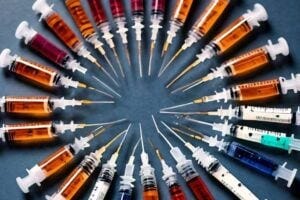 a circle of syringes