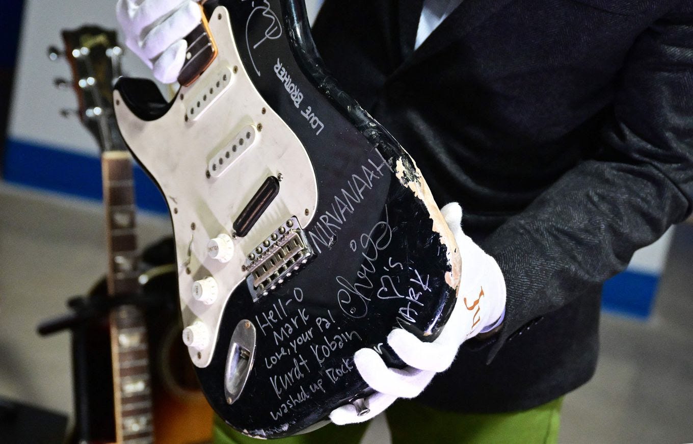 The guitar has been put back together but is no longer playable. (Frederic J. Brown/AFP/Getty Images)
