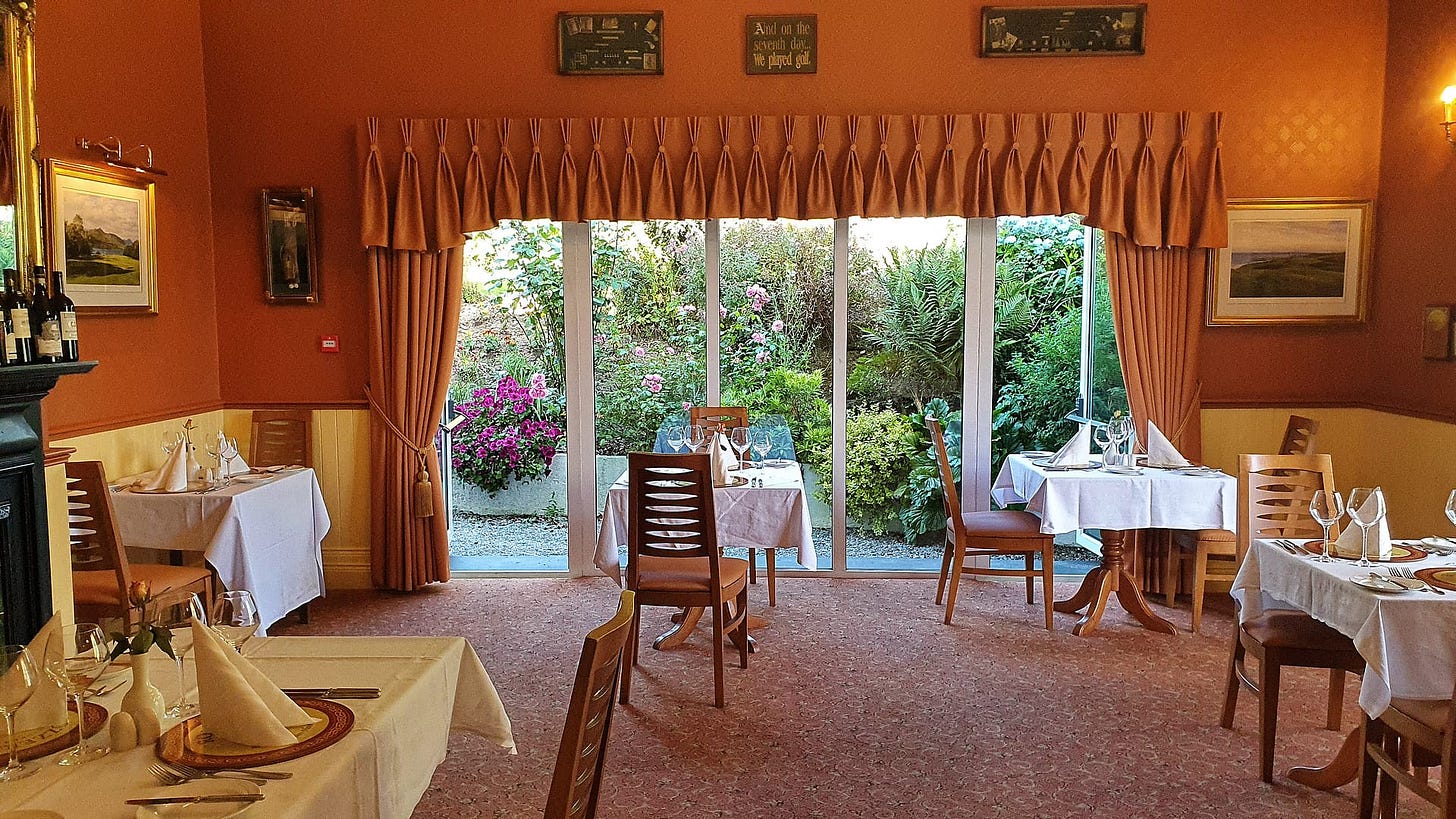 The warm and cheerful dining room in Rozzers Restaurant