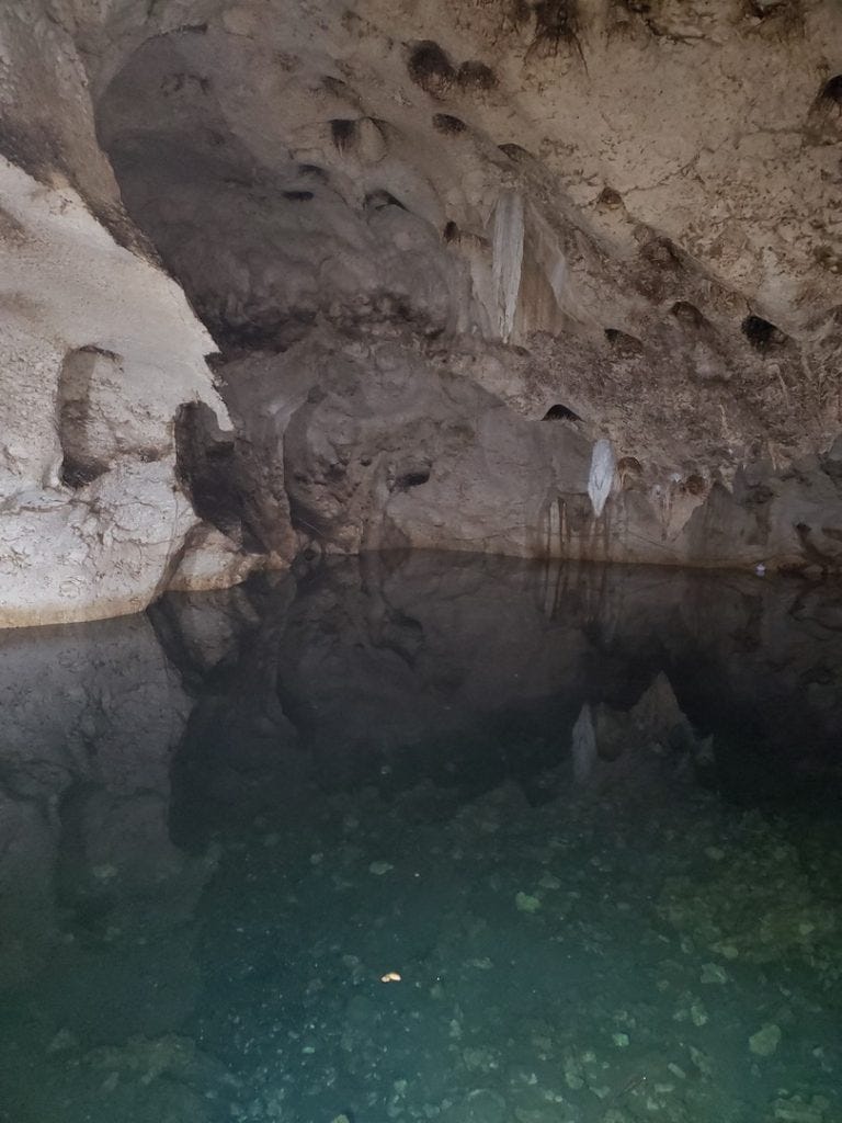 underground lake inside green grotto caves