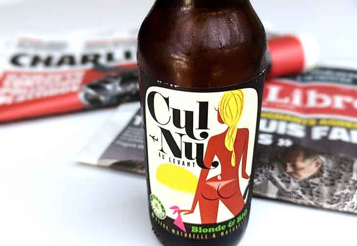 Photo of a beer bottle whose label bears the title 'Cul Nu' and a naked backside.