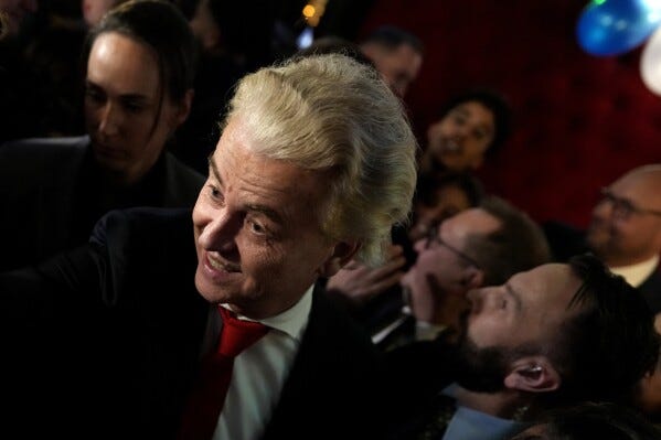Geert Wilders, leader of the Party for Freedom, known as PVV, smiles after announcement of the first preliminary results of general elections in The Hague, Netherlands, Wednesday, Nov. 22, 2023. (AP Photo/Peter Dejong)