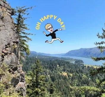 An avatar of M.A. Hastings in a black long sleeved tee shirt, beige pants and red flats leaping off of a cliff at the Columbia River gorge.  She has a big smile on her face as she’s motioning a forward motion with her hands and arms and saying “Oh Happy Day!”
