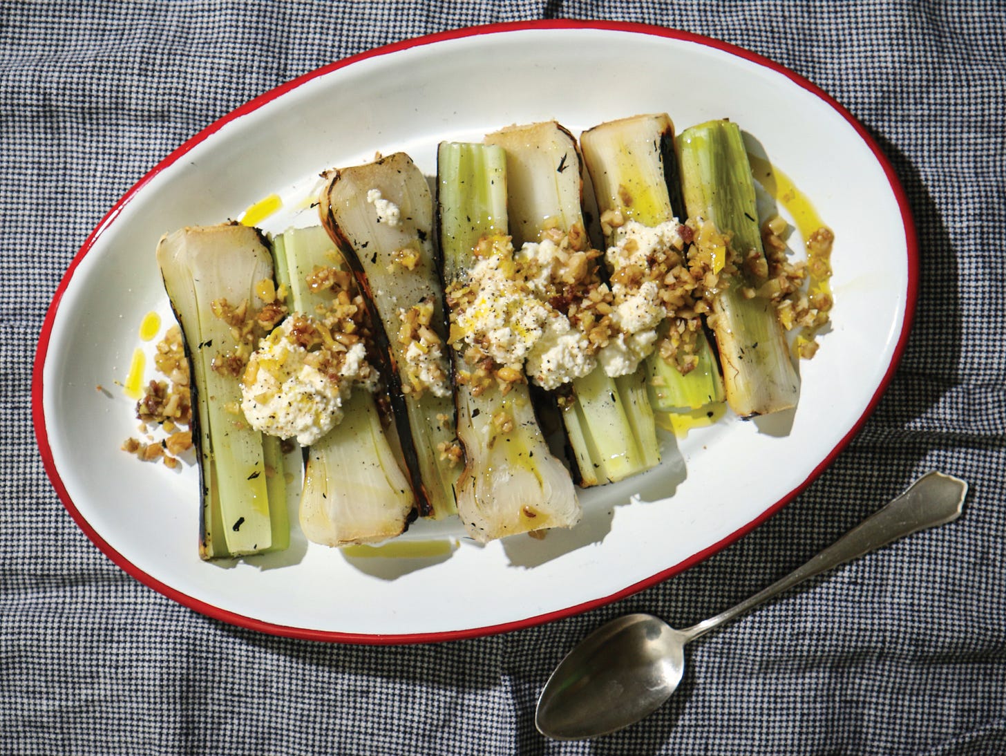 Platter of ember-roasted leeks.