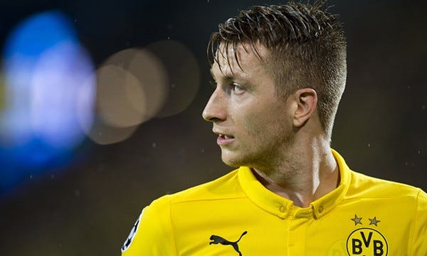 marco reus signs with borussia dortmund soccer league 2015 images