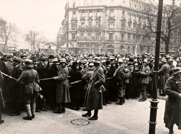 German guards controlling a crowd in Berlin in March 1920.