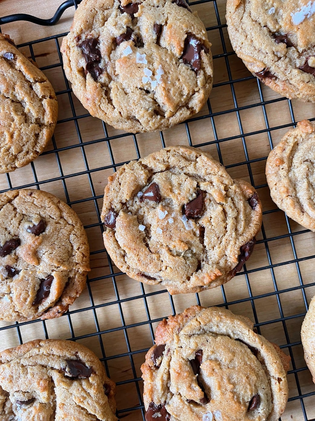 tahini chocolate chip cookies on a cooling rack