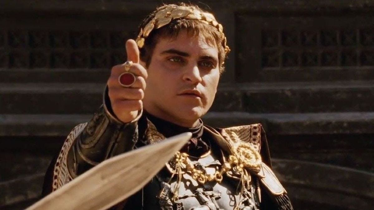 Joaquin Phoenix giving a thumbs up in Gladiator