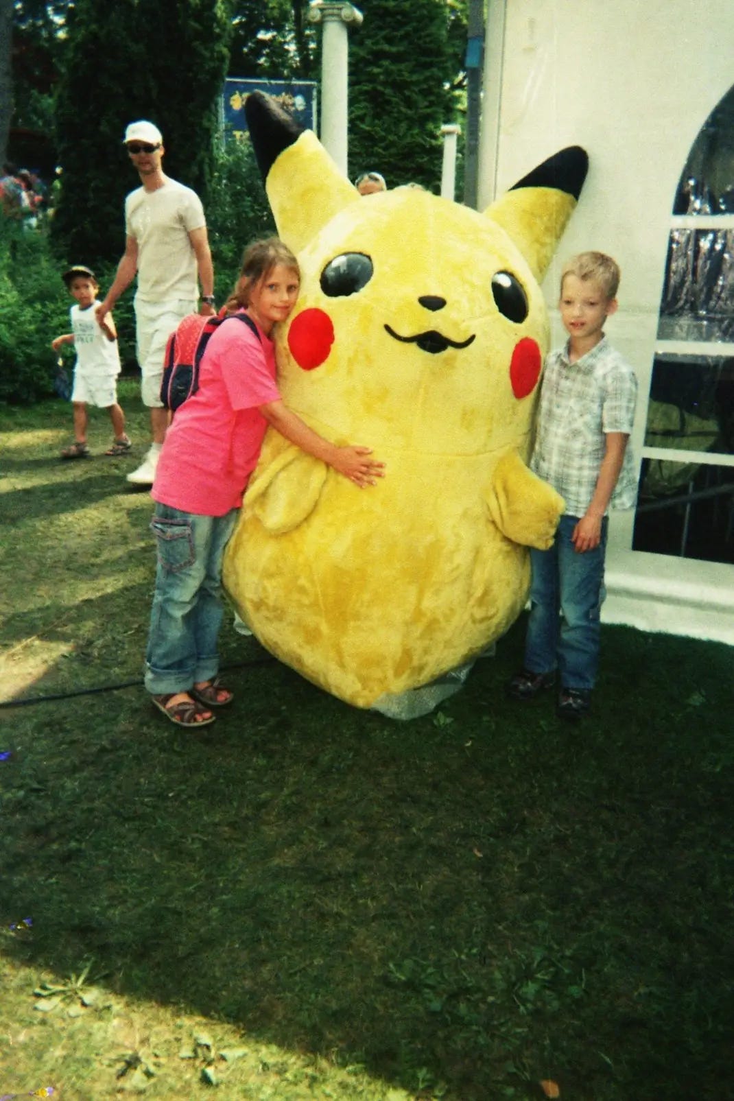 Another photograph of Kimberley hugging a Pikachu mascot