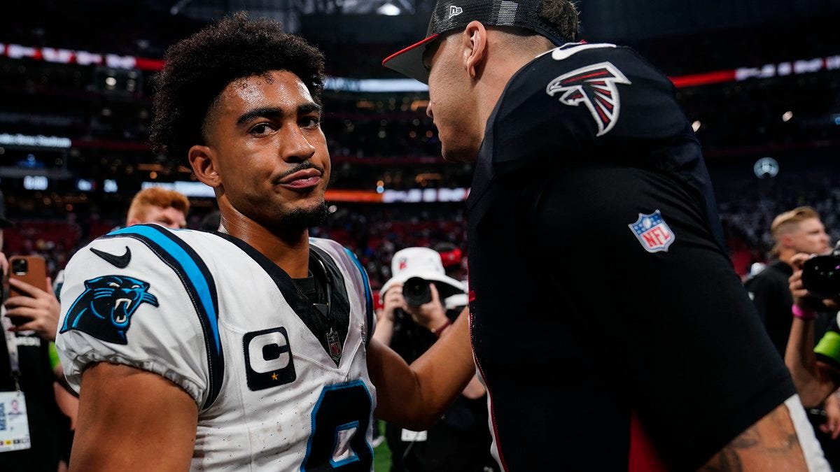 Bijan Robinson outshines top pick Bryce Young as Falcons knock off Panthers  24-10