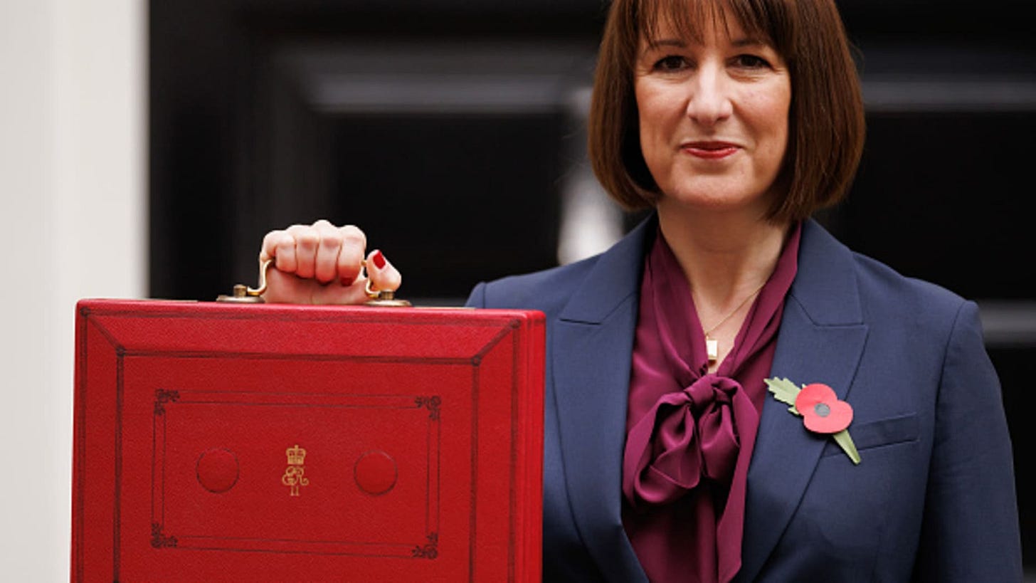 LONDON, ENGLAND - OCTOBER 30: Chancellor Rachel Reeves poses with the red box outside number 11 Downing Street on October 30, 2024 in London, England. This is the first Budget presented by the new Labour government and Chancellor of the Exchequer, Rachel Reeves. (Photo by Dan Kitwood/Getty Images)