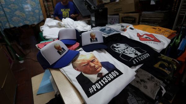 2024 US Presidential Elections: Former US President Donald Trump's campaign  emblazons merchandise with his mugshot | Mint