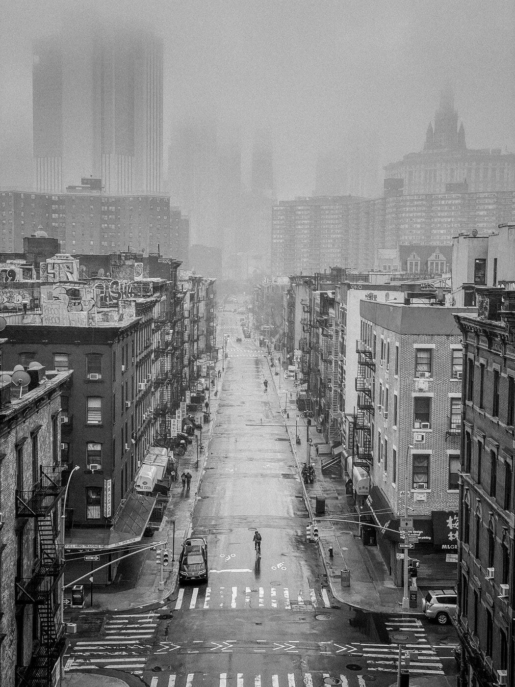 A view of downtown Manhattan and Chinatown on a foggy, wet day during the Coronavirus lock down in New York, N.Y.