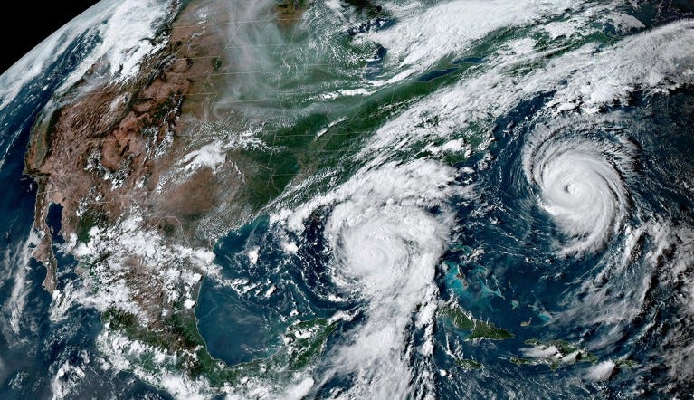 NOAA GEOS-East satellite image showing Hurricane Idalia, center, as it moves up the Gulf of Mexico and Hurricane Franklin, right, as it moves up the Eastern Seaboard of the Atlantic Ocean, August 29, 2023.