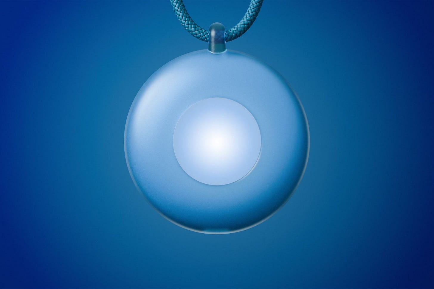 A photo of a blue orb on a necklace.