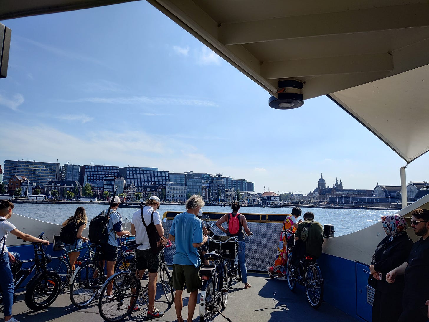 Aboard the ferry of Amsterdam Ij canal headed to the Central Train station in Amsterdam