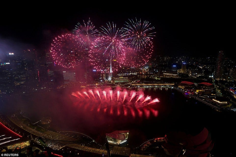 SINGAPORE: Fireworks explode over the Marina Bay during the New Year celebrations in Singapore, December 31, 2024