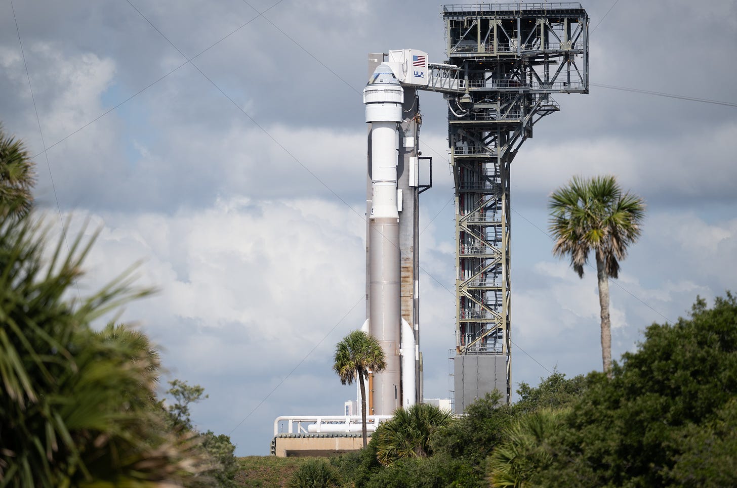A United Launch Alliance Atlas V rocket with Boeing’s CST-100 Starliner spacecraft aboard is seen on the launch pad at Space Launch Complex 41 ahead of the NASA’s Boeing Crew Flight Test, Monday, May 6, 2024 at Cape Canaveral Space Force Station in Florida. Photo Credit: (NASA/Joel Kowsky)